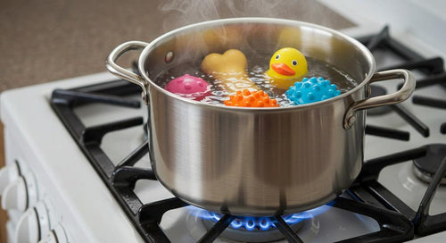 A pot of boiling water with dog toys being sanitized