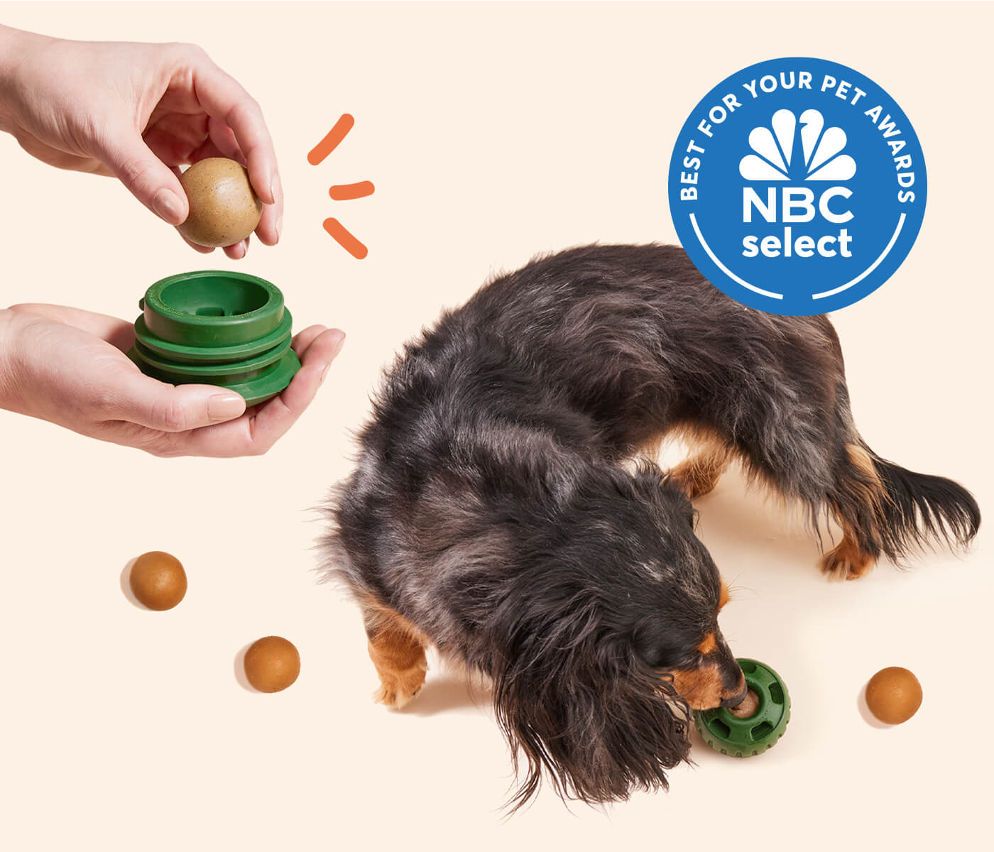 dachshund licking a pupsicle with pops surrounding the dog. A hand placing a pop in the pupsicle, with NBC Select badge